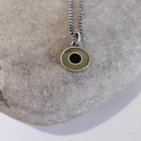 Necklace - Champagne, black oval.  by Zsuzsi Morrison